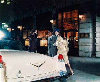 (ADVERTISING) Pair of upscale luxury automobile ads, comprising a well-heeled couple in front of Cartiers